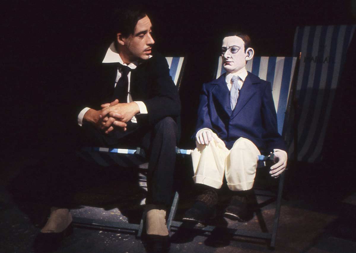 Handspan Theatre Ask For The Captain man and puppet man in conversation sitting on deckchairs