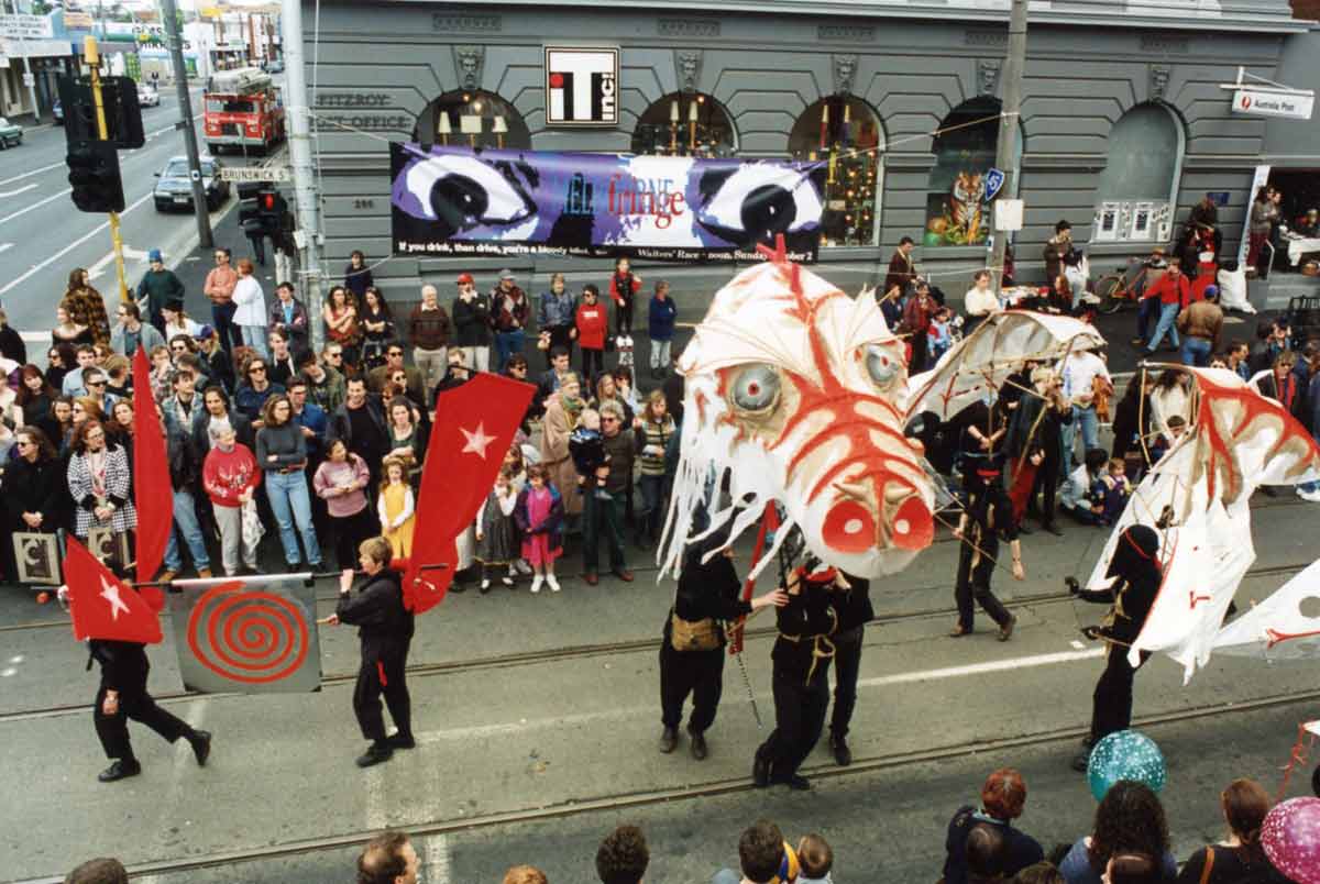 Held on the Breath of the Wind Handspan Theatre overhead view of large white paper and cane dragon Brunswick St Melbourne